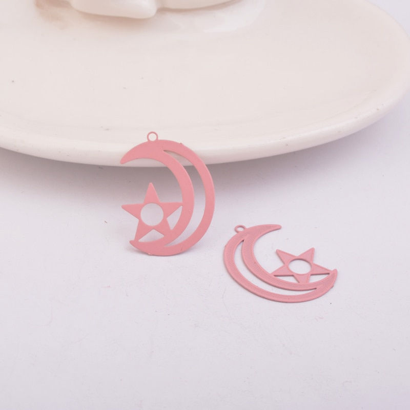Miniature : 2 estampes croissant de lune et étoile  - 25 x 19 mm - 10 coloris - laiton