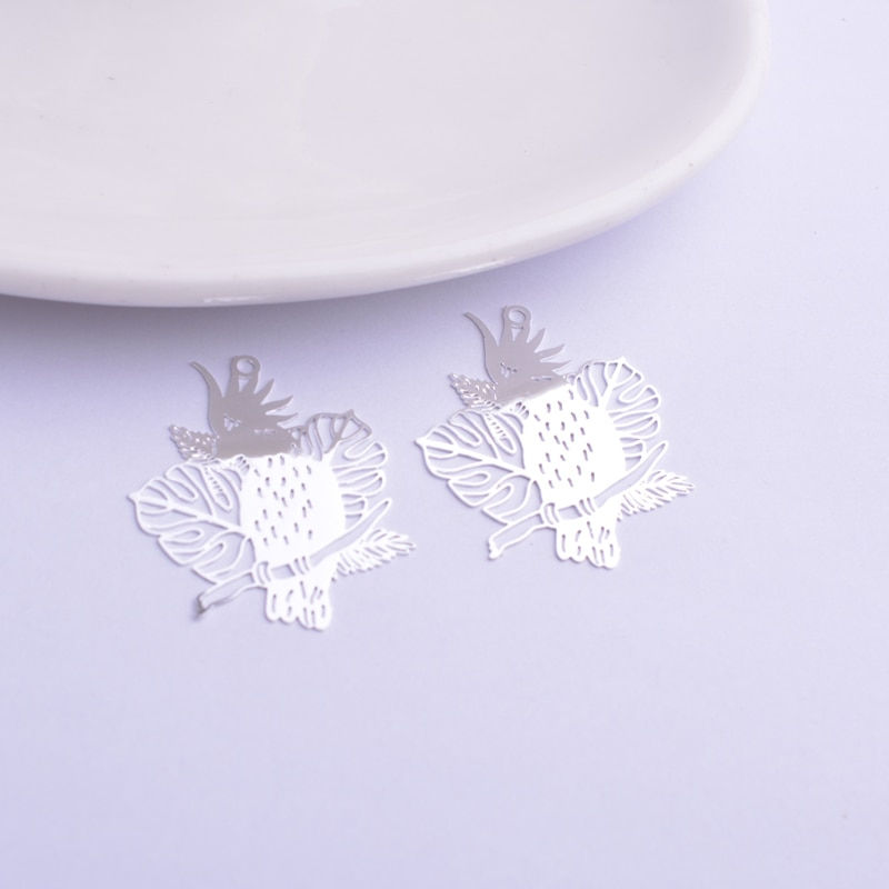 Miniature : 2 estampes perroquet  - 30 x 25 mm - laiton - 10 coloris au choix