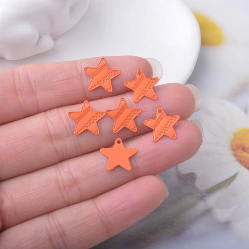 Miniaturbild: 4 estampes étoiles - 12 x 12 mm - 10 coloris - laiton