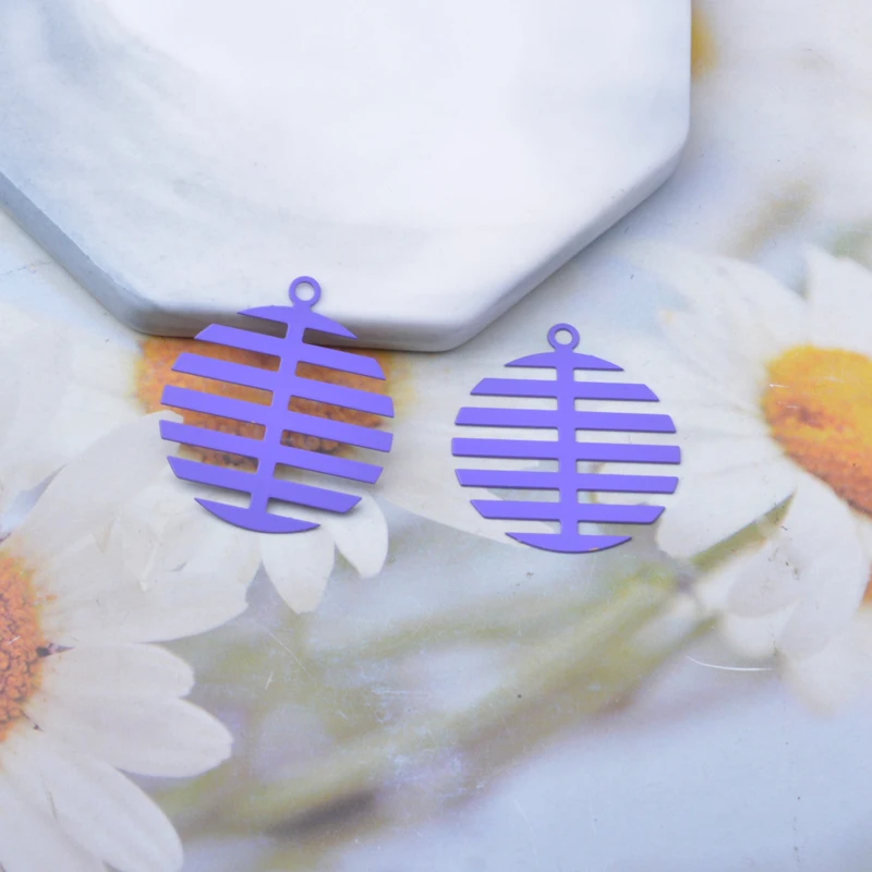 Miniature : 2 estampes rondes arêtes de poisson - 30 x 27 mm - laiton - 10 coloris