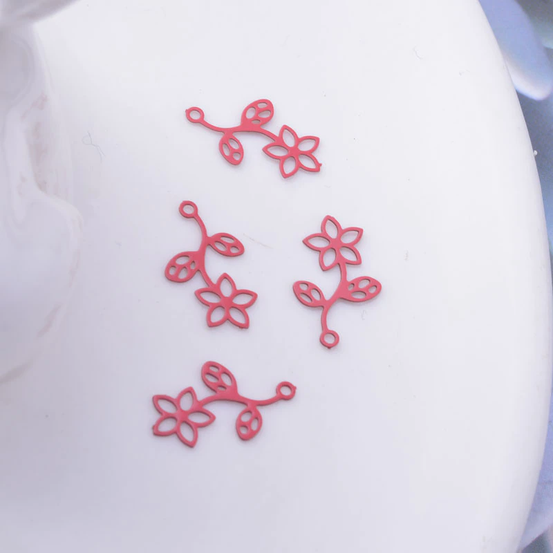 Miniature : 4 estampes petite fleur - 15 x 9  mm - 12 coloris - laiton