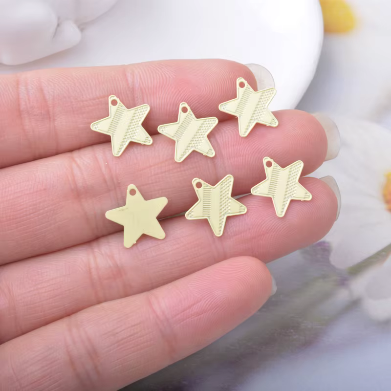Miniatura: 4 estampes étoiles - 12 x 12 mm - 10 coloris - laiton