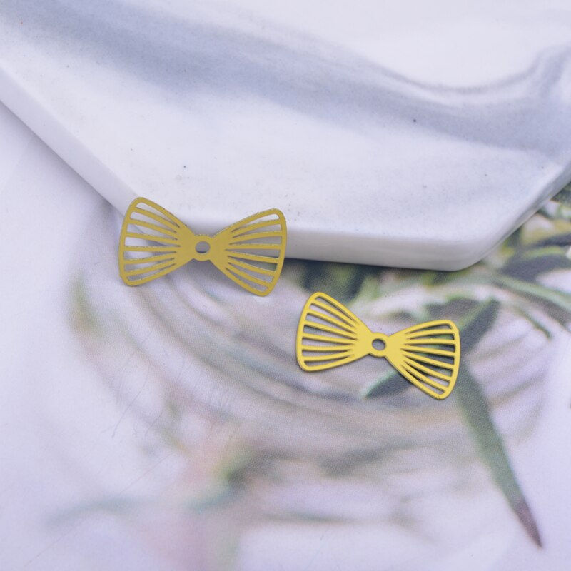 Miniaturbild: 4 estampes noeud papillon - 19 x 12 mm - 10 coloris - laiton