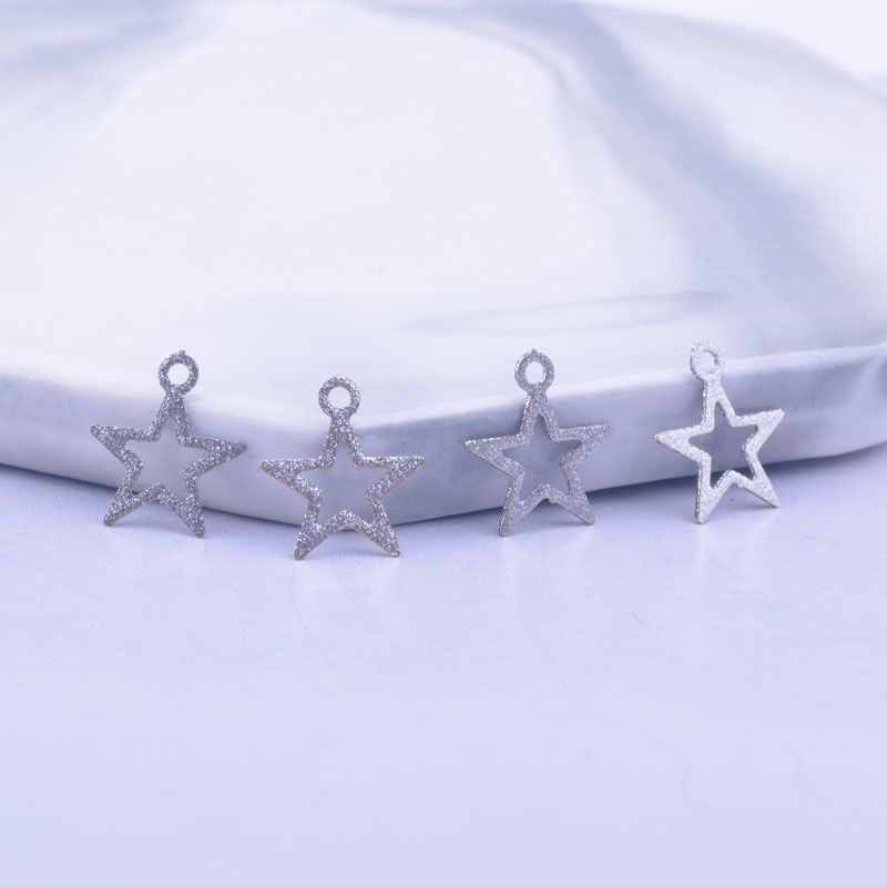 Miniature : 10 estampes étoiles 11 x 10 en laiton - 14 coloris