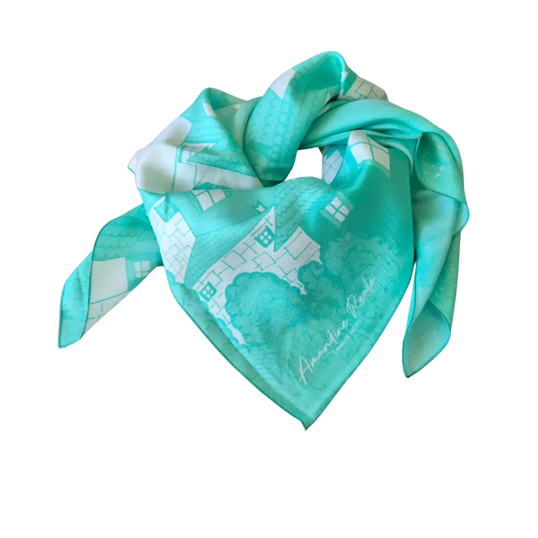 Carré de soie Acidulé turquoise, présenté plié.