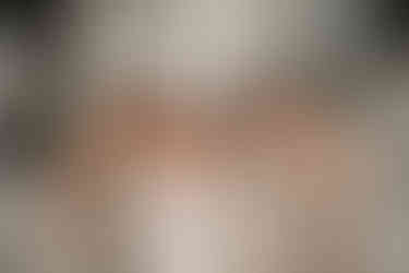 A bride and her bridesmaids posing for kansas city wedding photographer