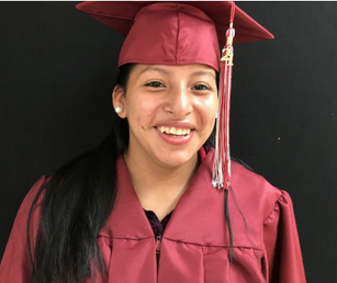 Association House High School graduate in cap and gown. Female-Hispanic.