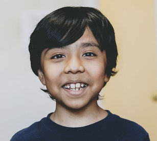 Young participant at the the Association House - Male, Child, Latino.