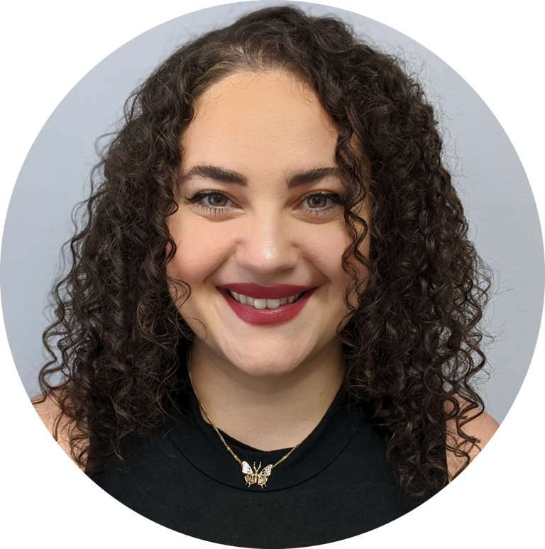 Headshot of Alicia Marrero, a hispanic female.
