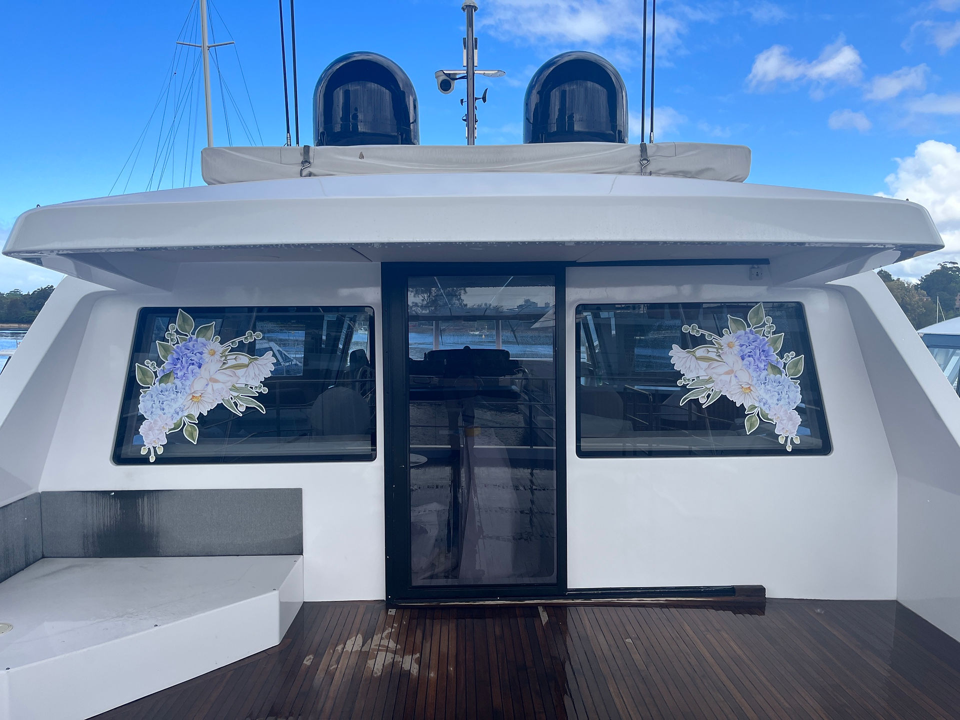 Corporate branding in temporary vinyl for a charter boat, AQA
