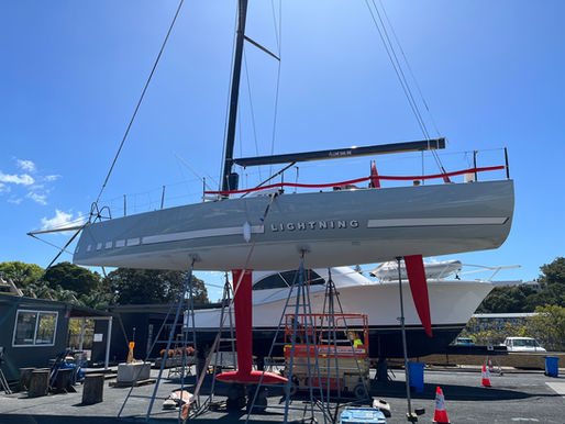 Custom boat Stripes and boat name "LIGHTNING" on a 40ft Yacht