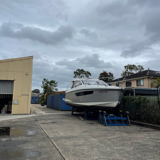 Yacht hull wrap detail in satin white aluminium finish on Sealine S330
