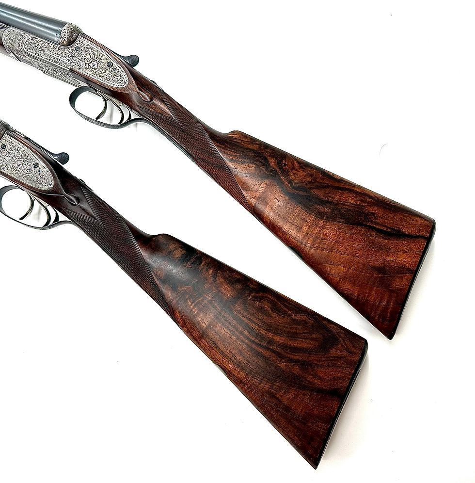 Thumbnail: William Evans 12g pair of guns