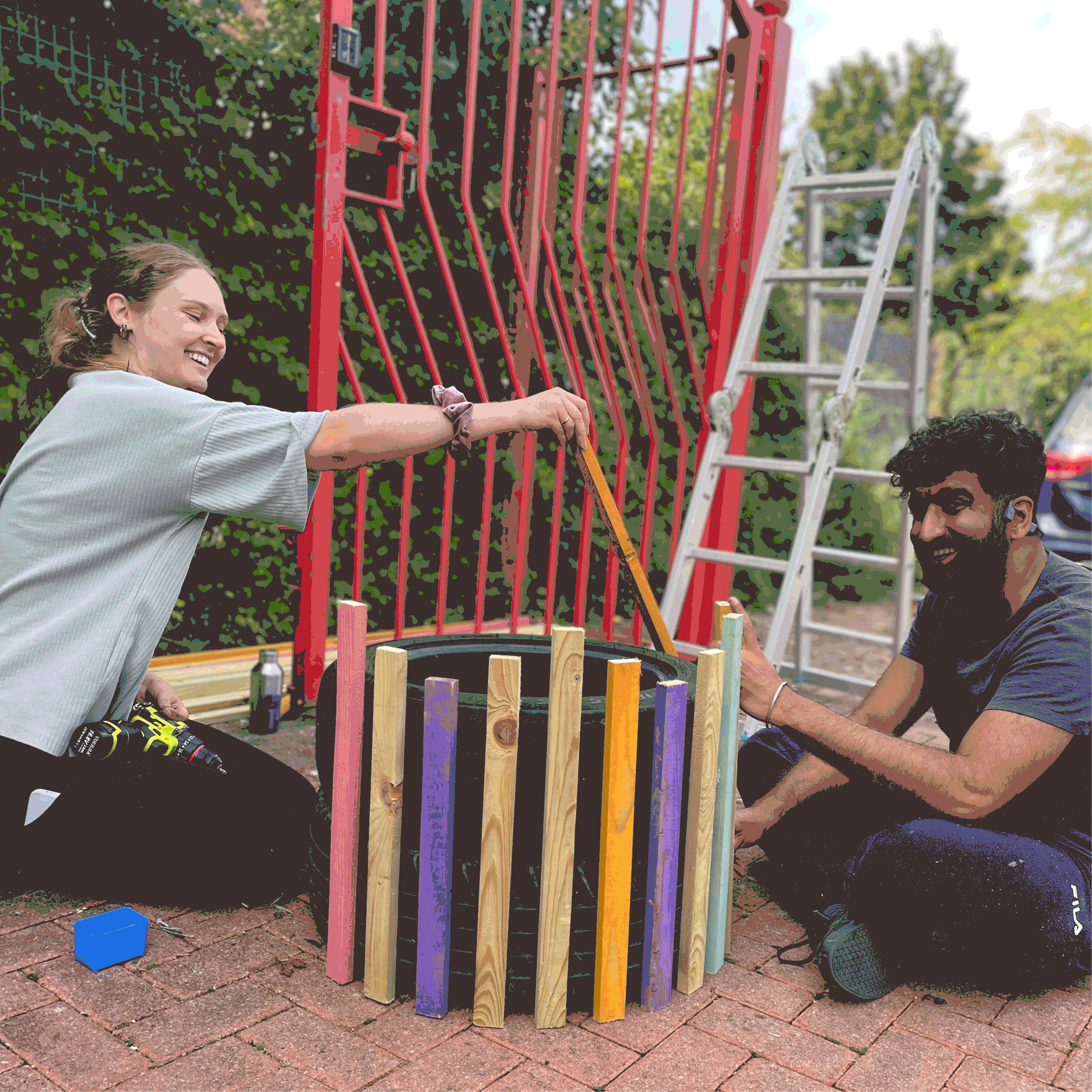 GIF showing ArchitecturePLB team planting greenery and building timber furniture.