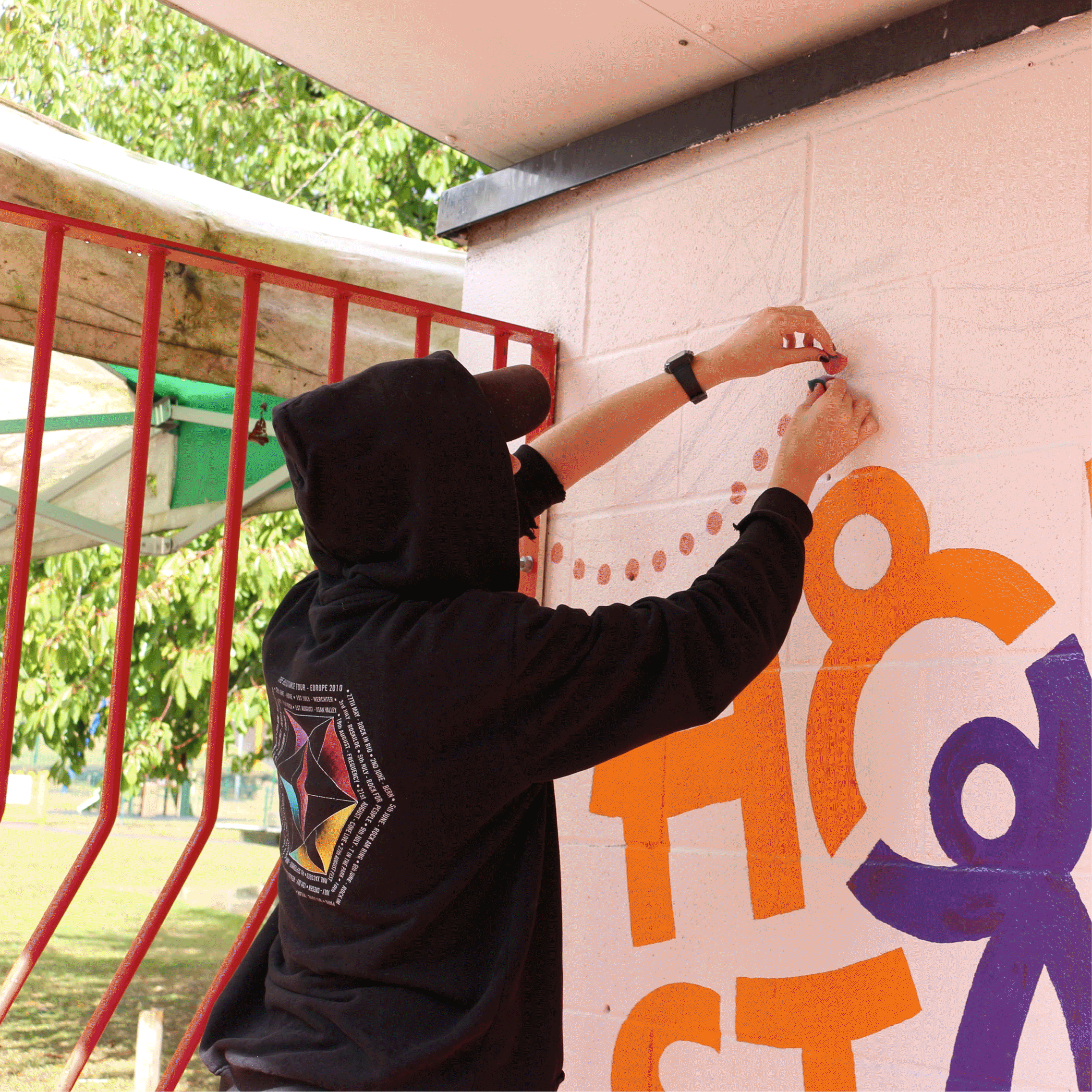 GIF of the mural painting and timber construction process at Home-Start Winchester and Districts