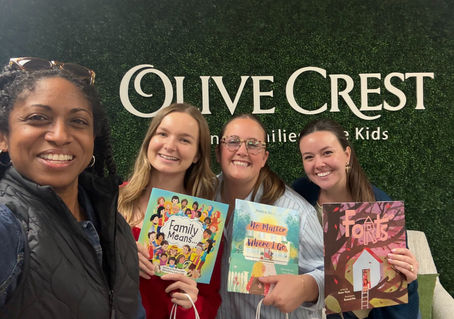 Foster Book Club founder with 3 Olive Crest employees
