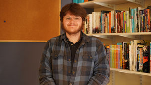 WRUS English Language Arts classroom featuring graphic novels, film posters, and multimedia resources that support student learning and engagement.