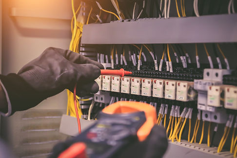 close-up-hand-electrical-engineering-using-measuring-checking-electricity.jpg