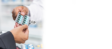 A closeup of a pharmacist handing a blister pack to a customer with a ScripTalk hang tag attached to it.