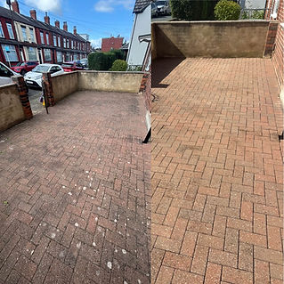 Side-by-side comparison of a brick driveway before and after cleaning