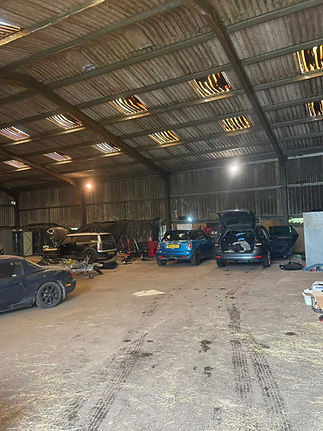 Car workshop with multiple vehicles