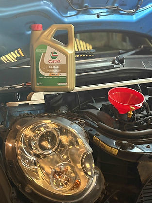 Engine oil and funnel