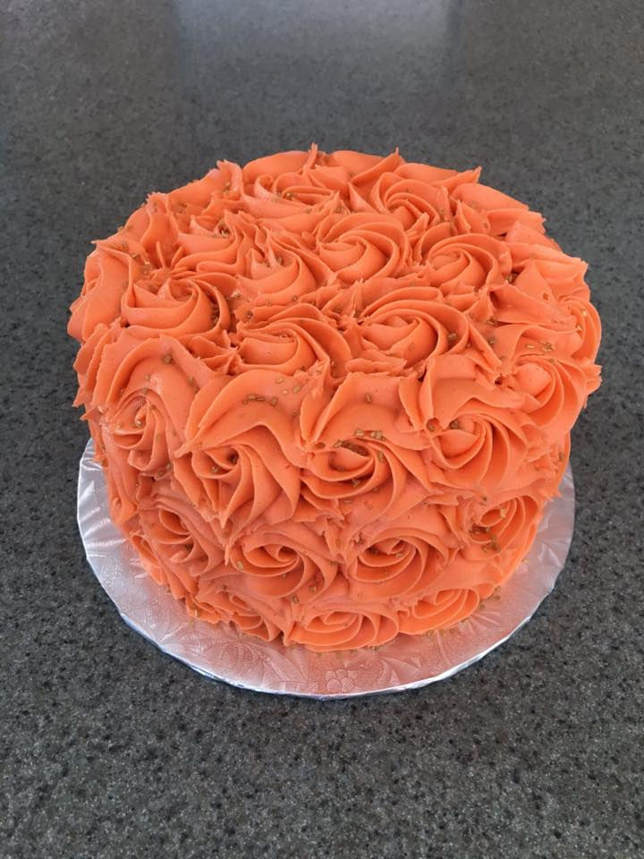 Orange Rosettes with Gold Sprinkles