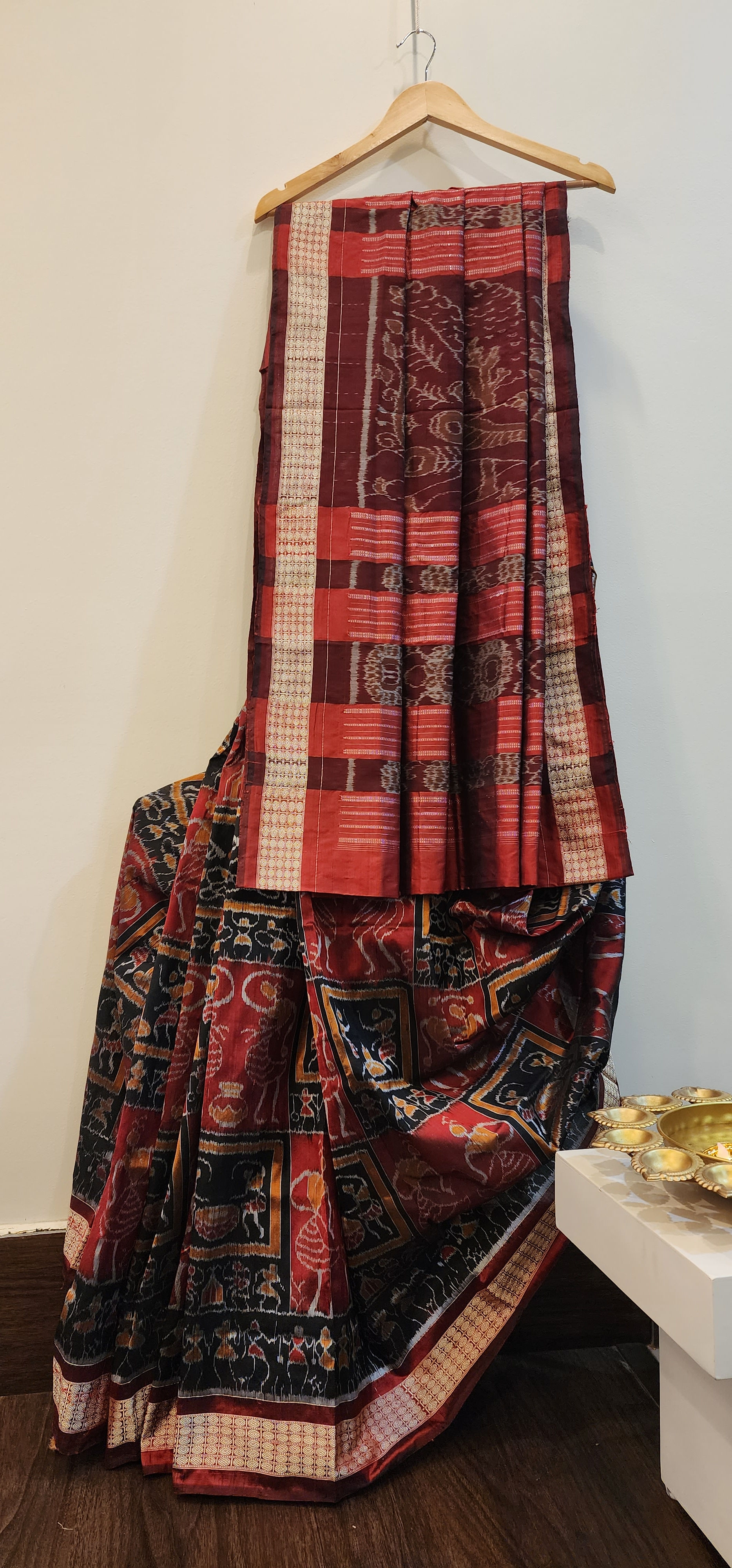 Maroon, Brass, Black Travel Box Tribal Design Sambalpuri Ikat Silk Saree Front View