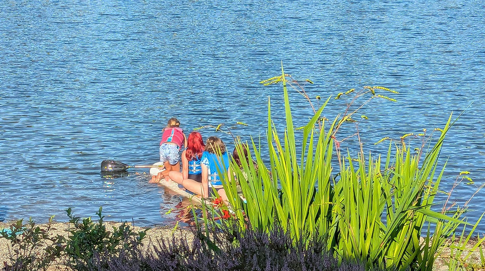 Kids enjoy the lake on summer days.