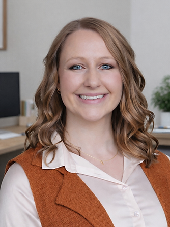 Smiling woman in office setting.