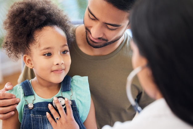 father and daughter at the doctor