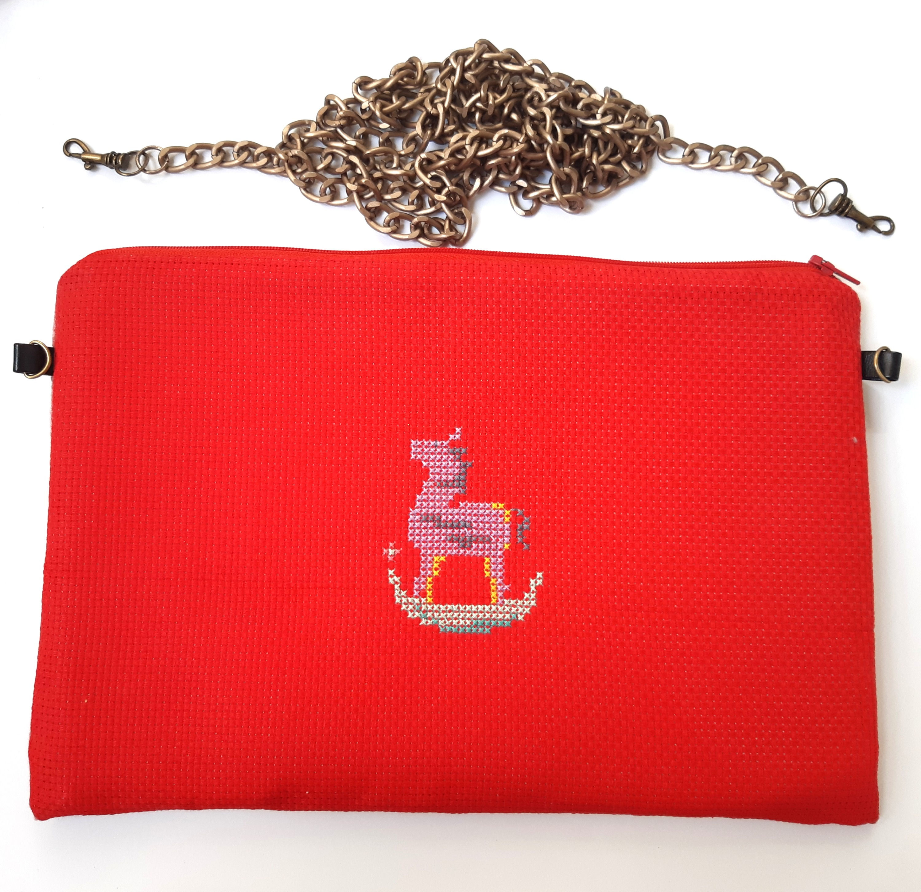 A bag that is a wallet - a rocking horse