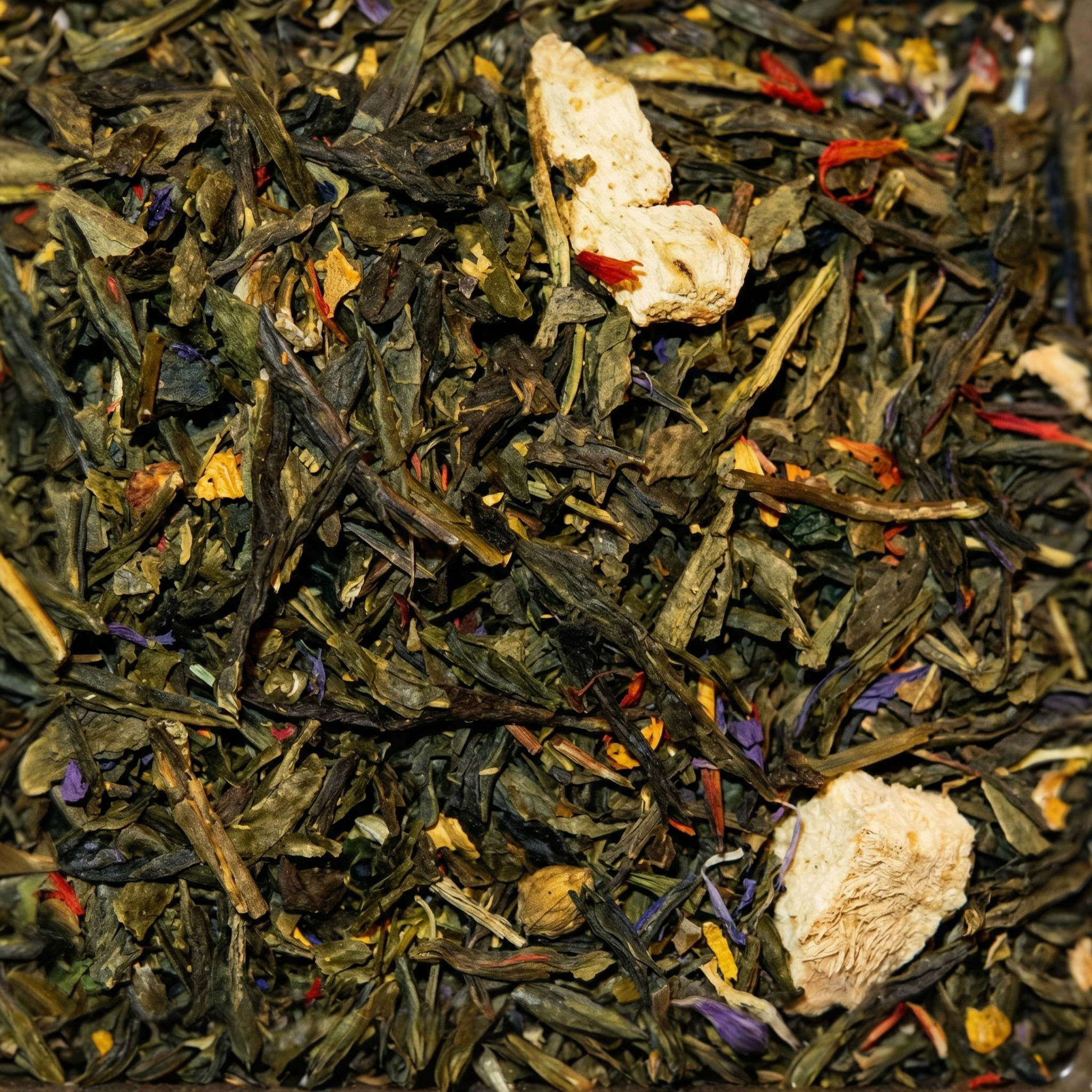 Cinnamon Orange- Green Tea, a premium loose leaf green tea made with China Sencha, Orange Peels, Cinnamon, Mallow Flowers, Sunflower Pe