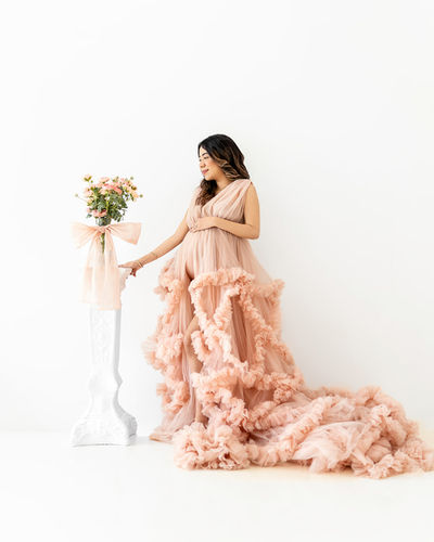 Pink gown maternity dress photoshoot in Montrose area of Houston TX