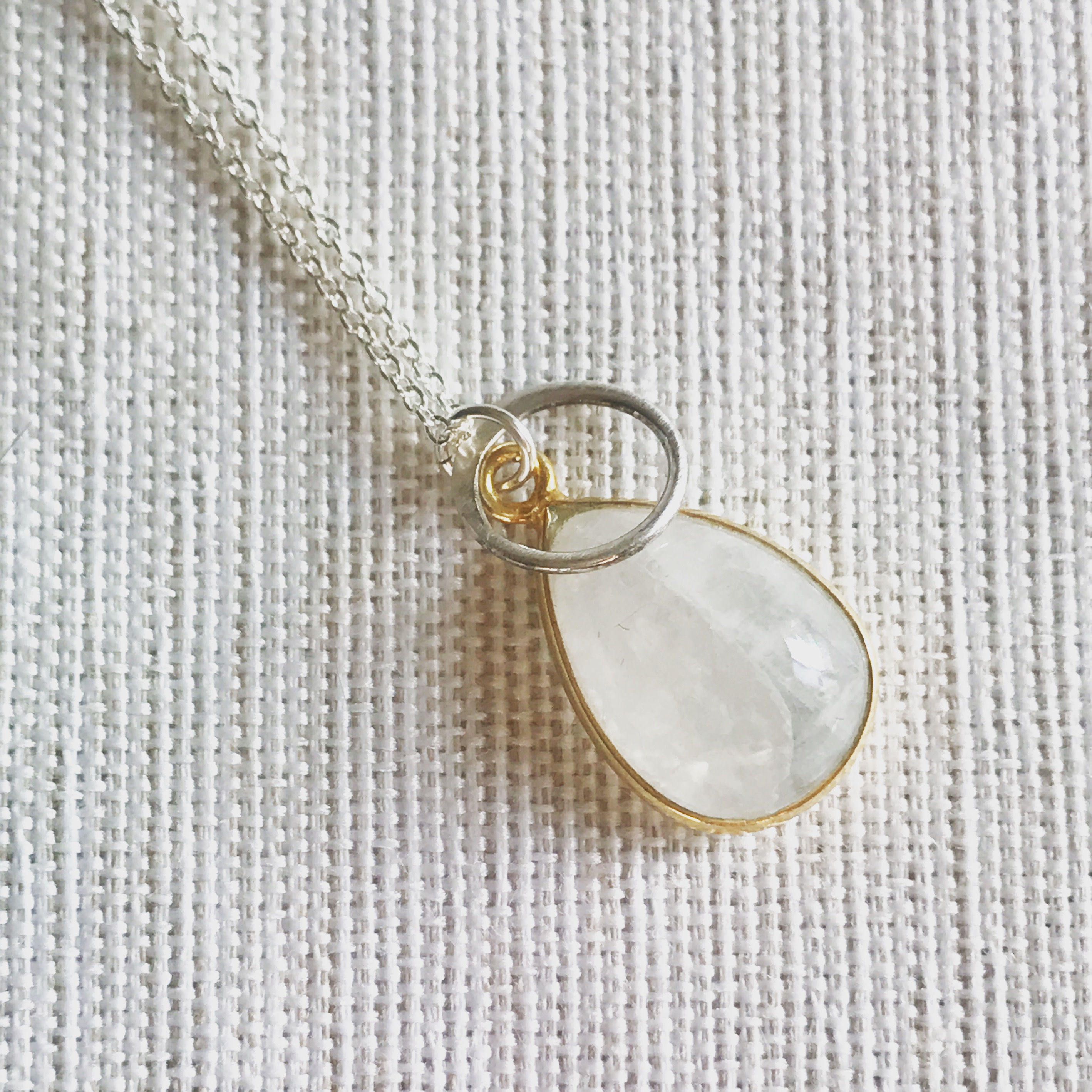 Two tone moonstone halo necklace