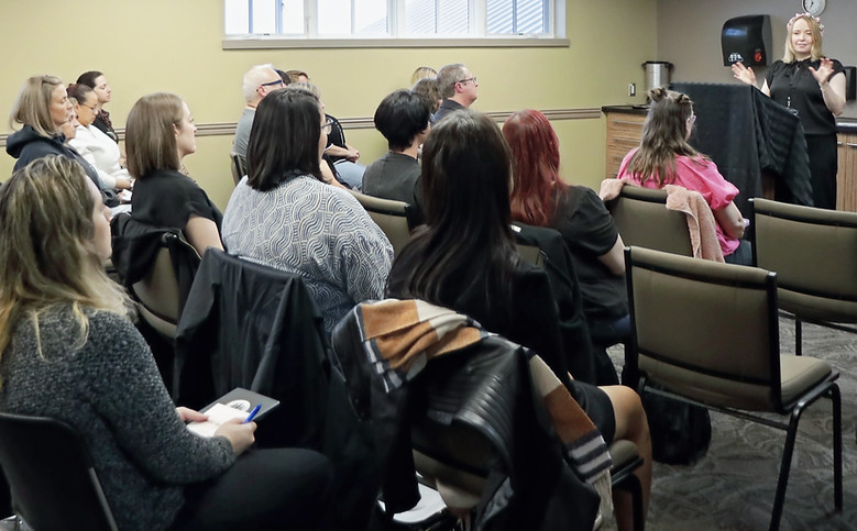 Attendees listening to an educational presentation at the Witches Gathering Conference hosted by Luna Events Canada.