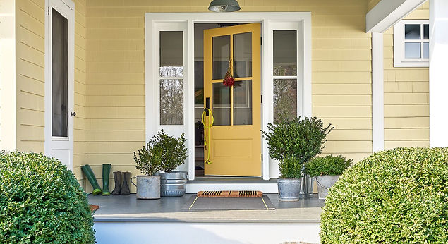 Yellow painted house using Benjamin Moore exterior paint