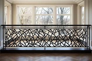 Custom ornamental steel railing on an interior balcony