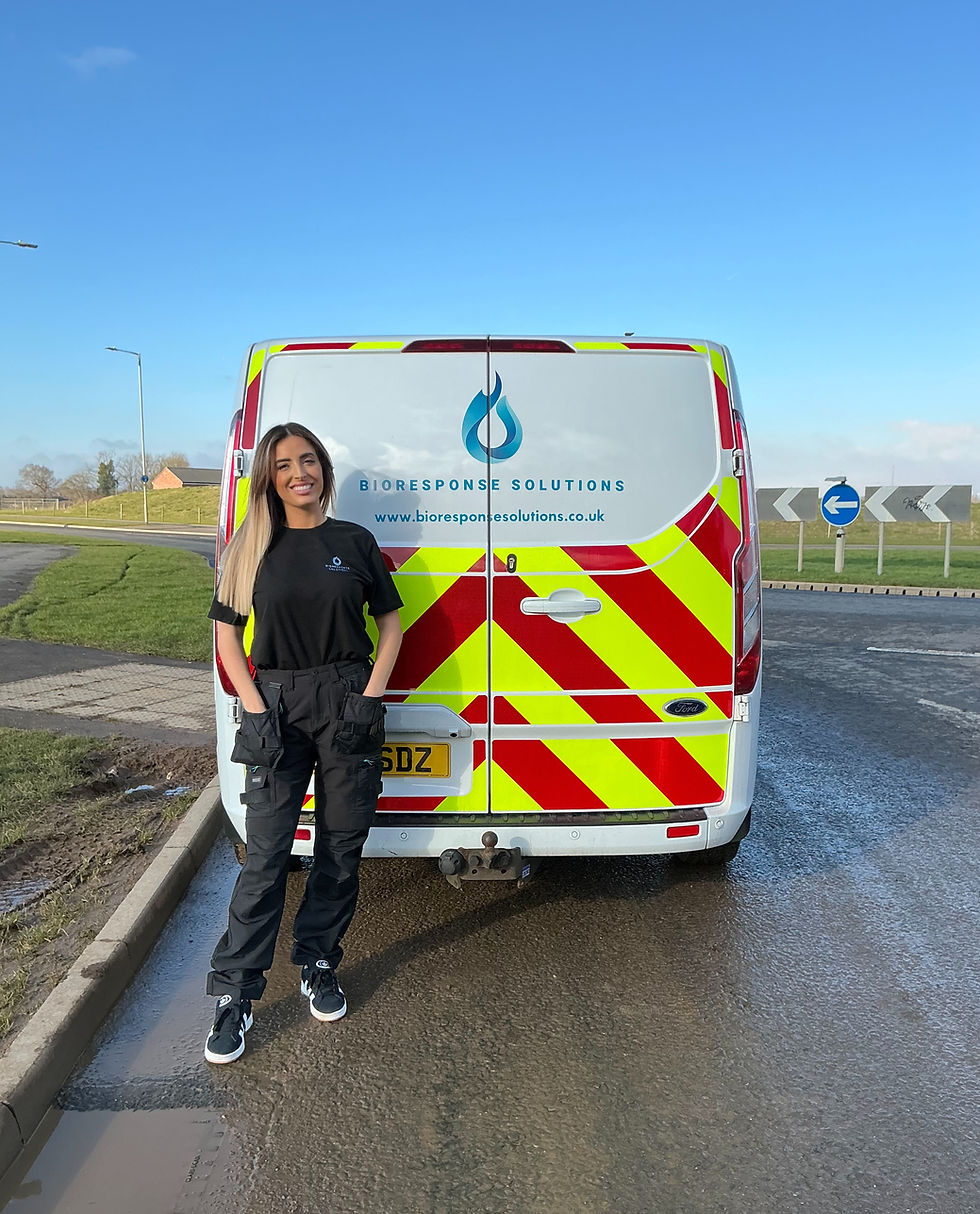 Laura Pearson, Director of BioResponse Solutions, standing beside company response van.