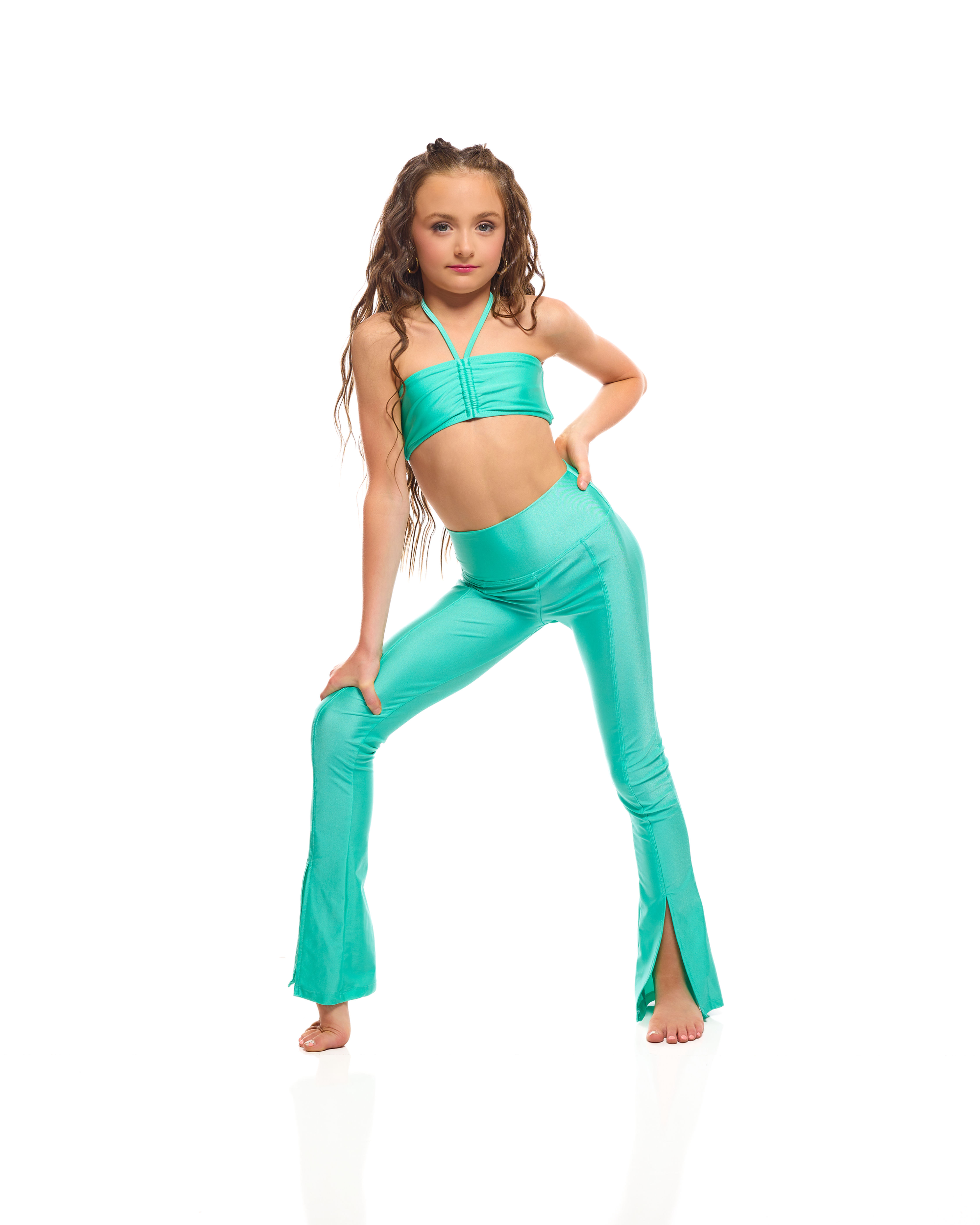 Girl in teal dance costume