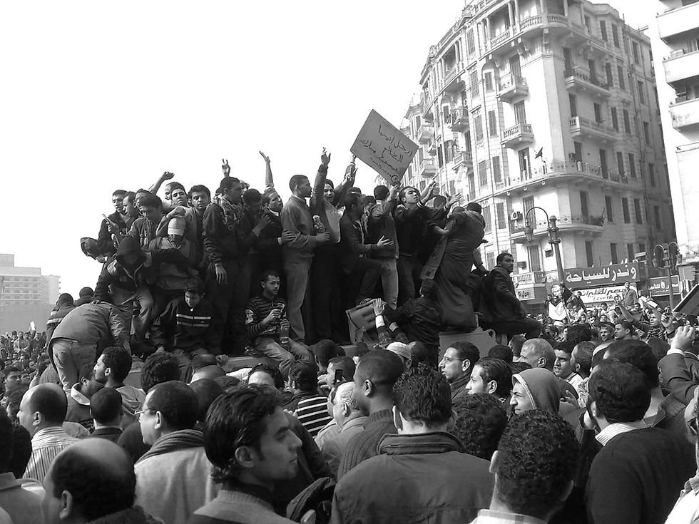 Demonstrators on Army Truck in Tahrir Square, Cairo Date: 29 January 2011 Photographed by: Ramy Raoof, CC BY 2.0