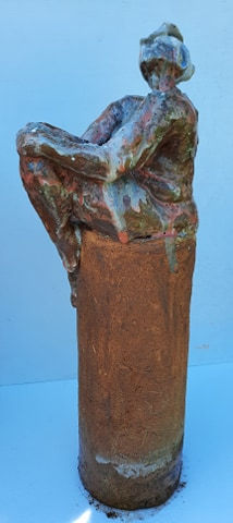 Thumbnail: Lady holding her knee on a column