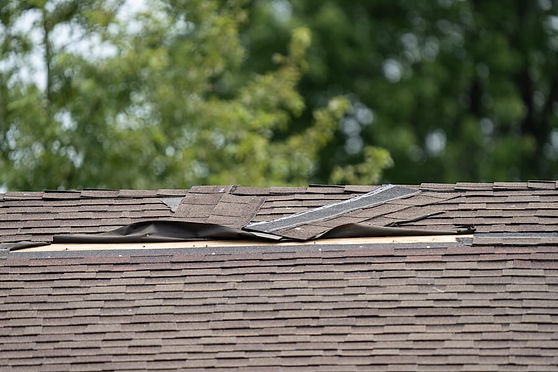 An image of a damaged roof that needs to be replaced