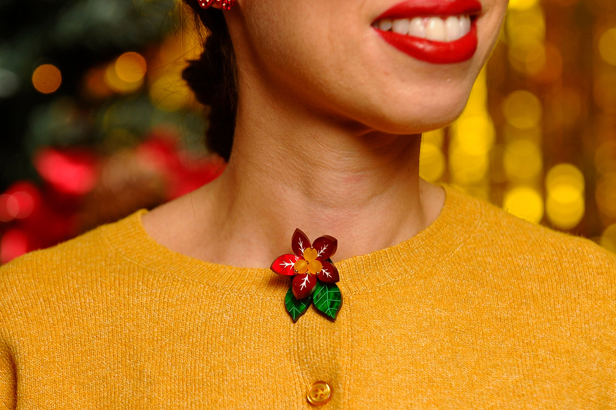 Cubre botón flor navideña