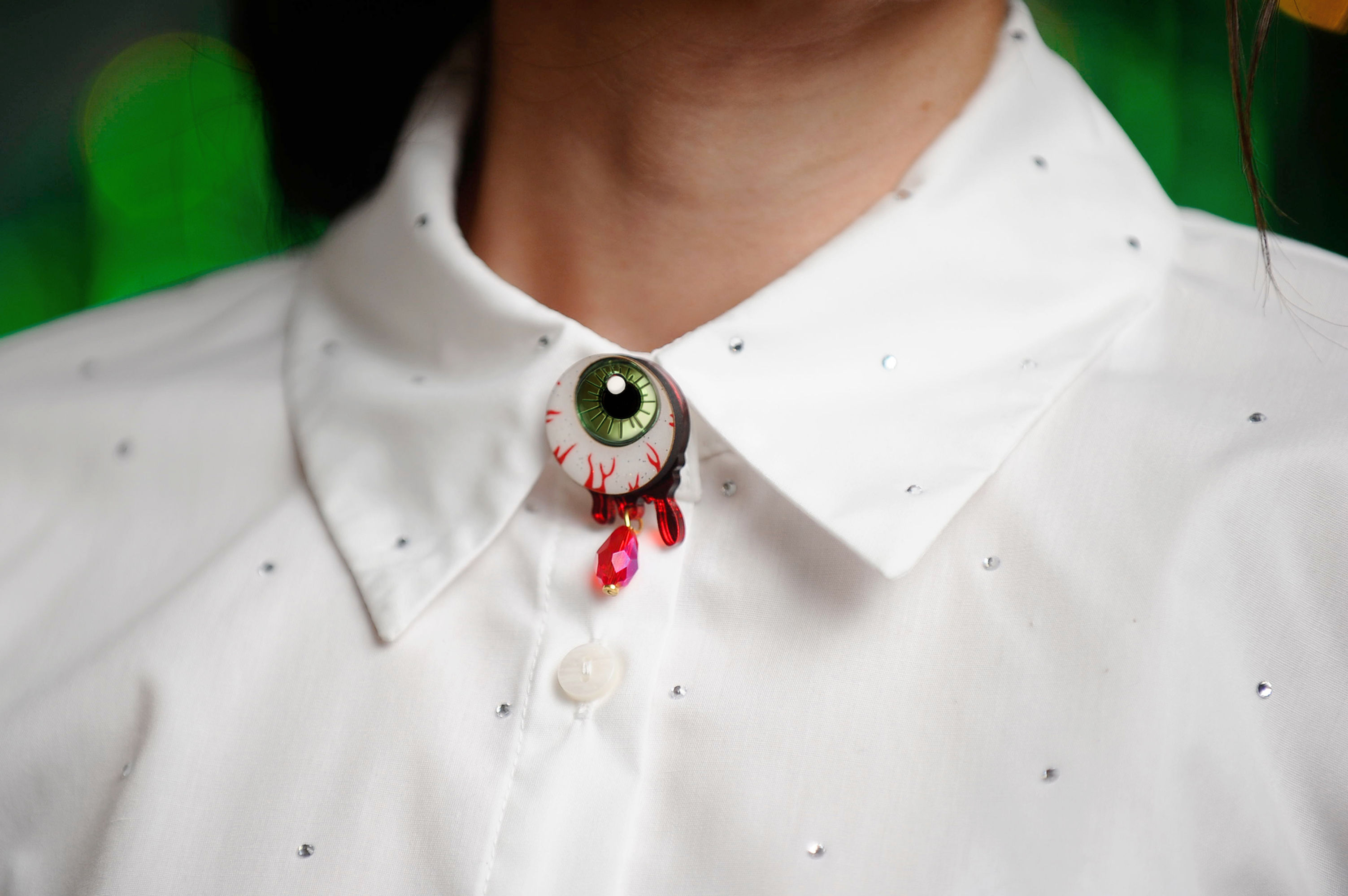 Cubrebotón Ojo Sangriento