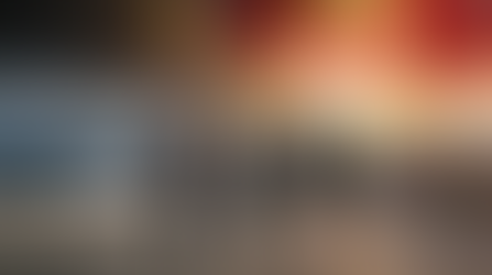 Diverse group of immigration applicants walking confidently on a Vancouver city street with the Canadian skyline and mountains in the background, representing Canada's 2026 Express Entry reform consultation