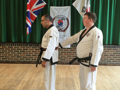 Tang Soo Do students practising controlled self-defence skills at Horangi Tang Soo Do Association in Crawley.