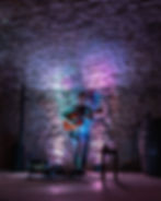 a guitarist playing in the cellar at a show hosted by the best restaurant in port clinton ohio