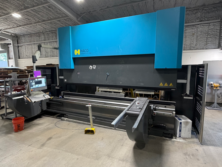 Haco Euromaster 220 ton 12 foot press brake equipped with a 6-axis backgauge, sheet followers in the front, Iris Lazersafe finger protection, and a Fastbend 2D MultiTouch Control