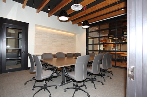 Wood veneer millwork ceiling panel and accent detail, Front Range conference room